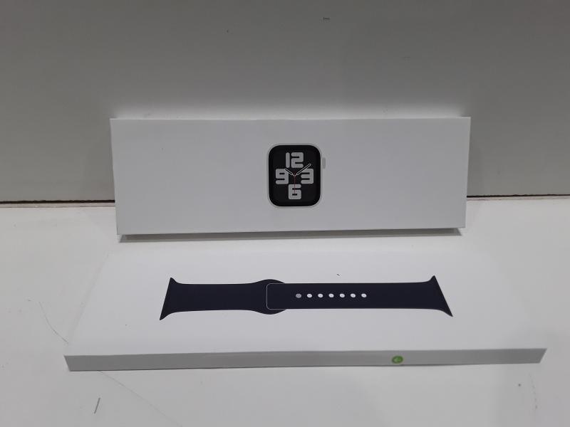 NEW - Apple Watch SE (2nd Gen) [GPS] with Silver Aluminum Case with Storm Blue Sport Band, M/L - MSRP $229