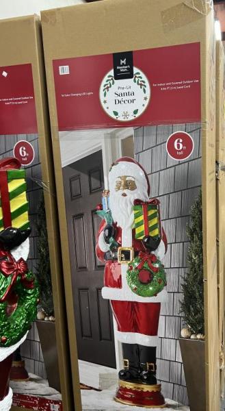6' Pre-lit Santa's- MSRP $1,600