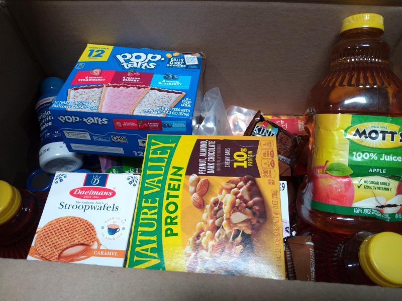 Groceries - Assorted Christmas Candy, Ensure Dark Chocolate Nutrition Shakes, Cheez-It Cheese Crackers - MSRP $12,425