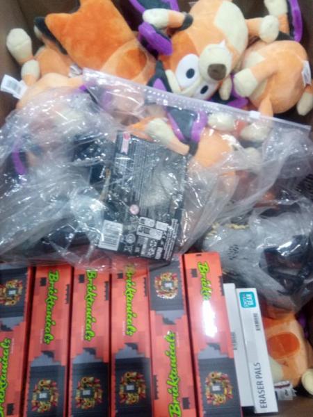 General Merchandise - Bluey's Halloween Plush, Brickcraft Harvest Wreath, Jurassic World Mask - MSRP $406