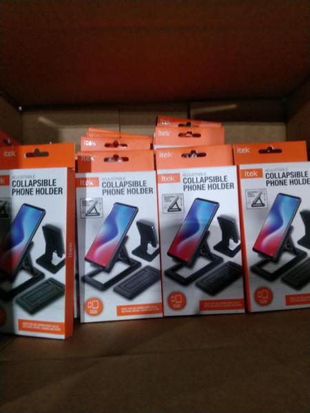 Four Packages of Itek Adjustable Collapsible Phone Holders - MSRP $1,199