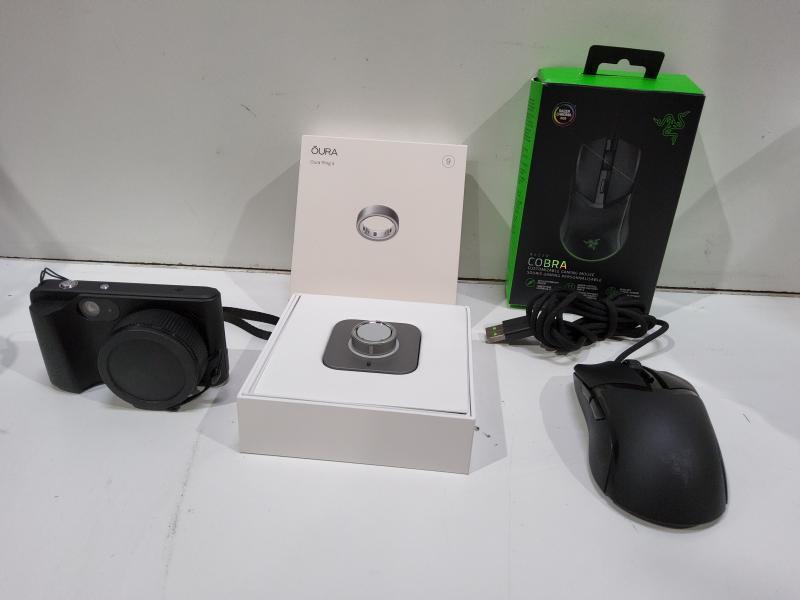 Electronics - TI84 Graphing Calculator, Rode Microphone, PowerA Meta Quest Charging Station - Est Retail $1,006