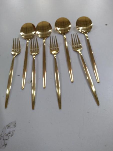 Parcel of Plastic Gold-Colored Flatware - MSRP $250