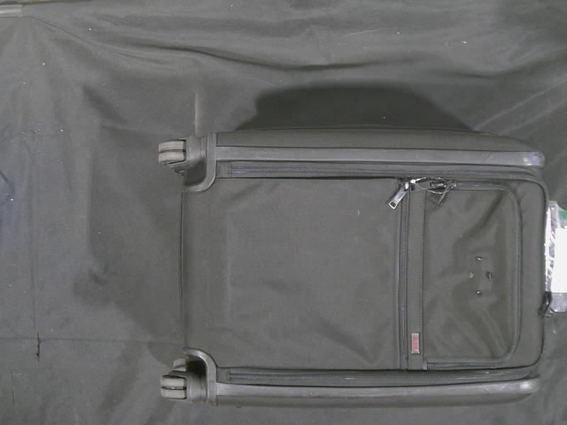Mystery Box - Assorted Luggage from Luxury Department Store - Original MSRP $1,050