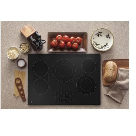 GE Profile PEP9030DTBB Electric Cooktop - MSRP $1,399