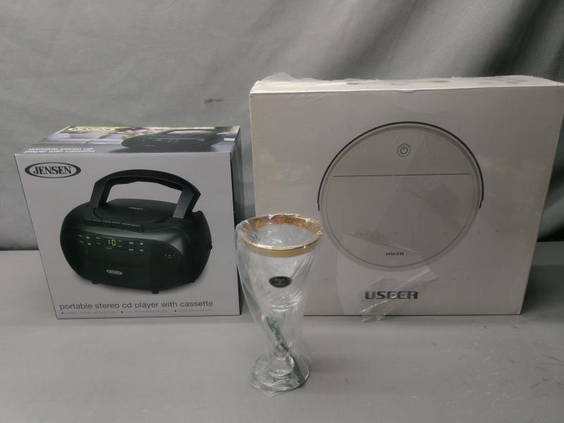 General Merchandise - Jensen CD Cassette Recorder, Swarovski Pendant Necklace, Useer Robot Vacuum - MSRP $3,656
