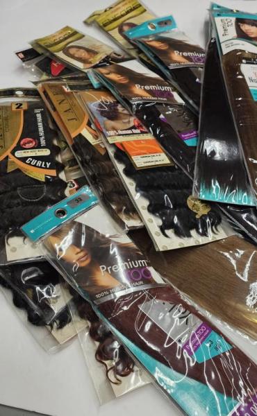 Assorted human extensions weaves and bulks sew-in and braiding. MSRP: $5,999